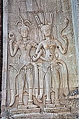 Angkor Wat temple, second enclosure, devatas sculpted in bas-relief with an extraordinary variety of intricate hair styles and costumes. 